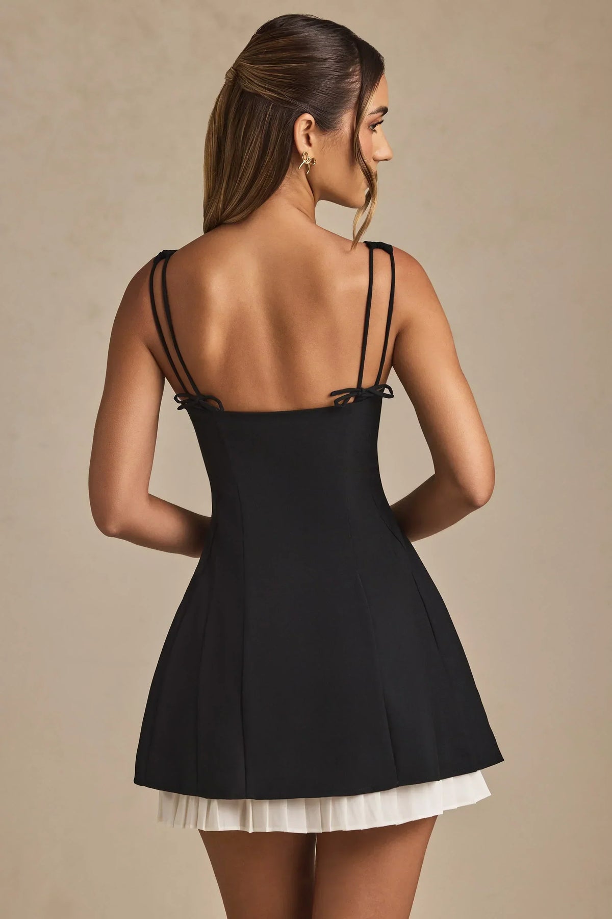 Bow-Detail Pleated A-Line Mini Dress in Black